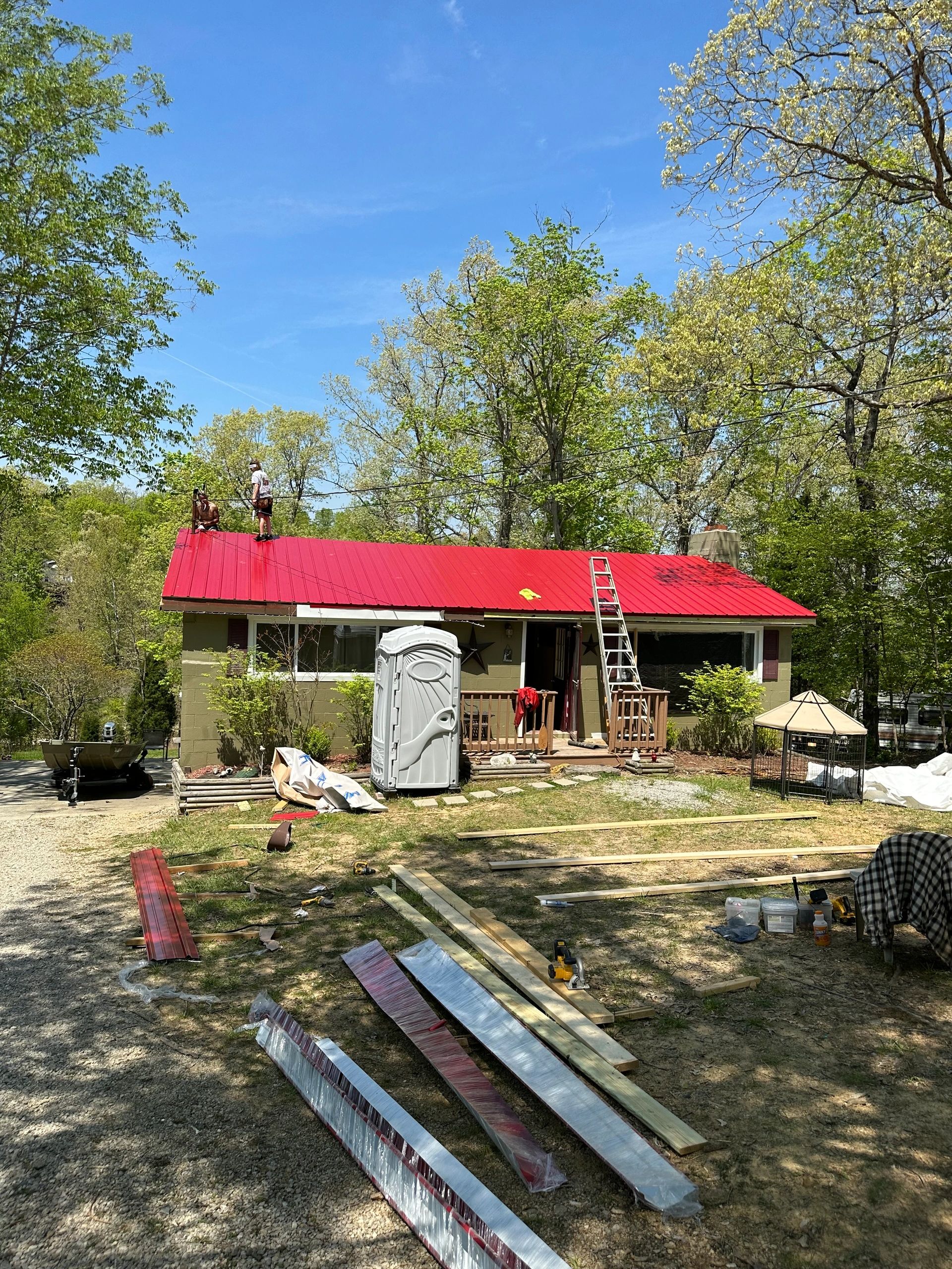 New standing-seam metal roof installation after storm hail damage repair — western Kentucky