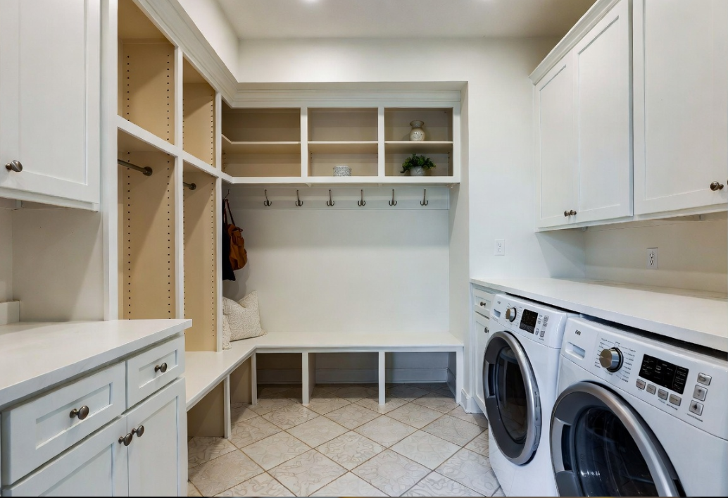 Mudroom and laundry room remodel in Grayson County, KY — tile floors and cabinetry by Universal Interiors