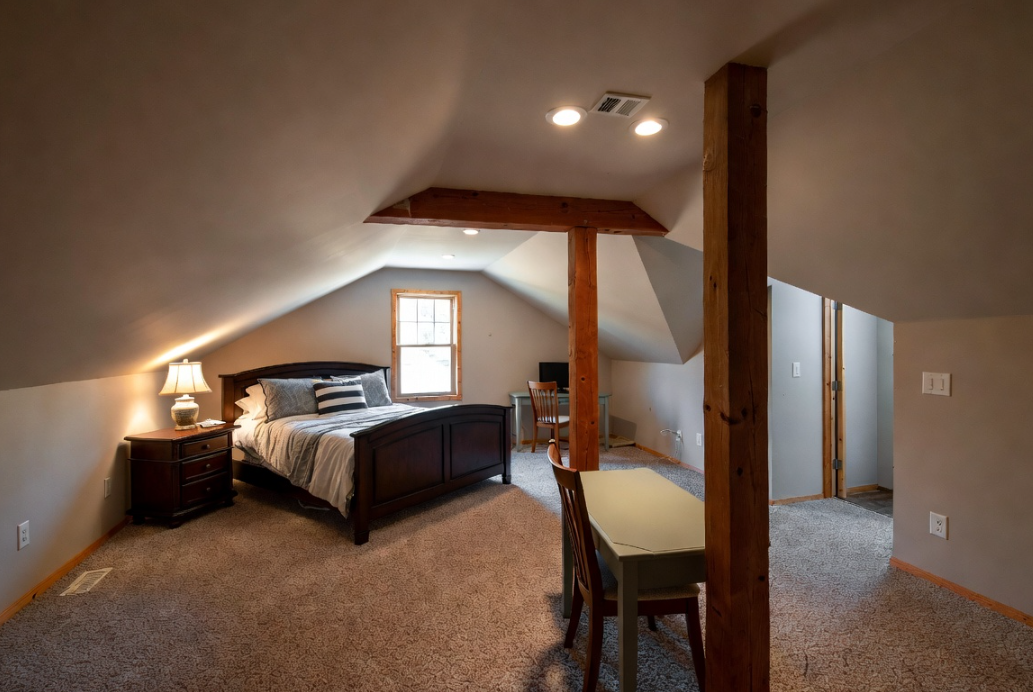 Attic conversion to livable space in Grayson County, KY — flooring and lighting by Universal Interiors
